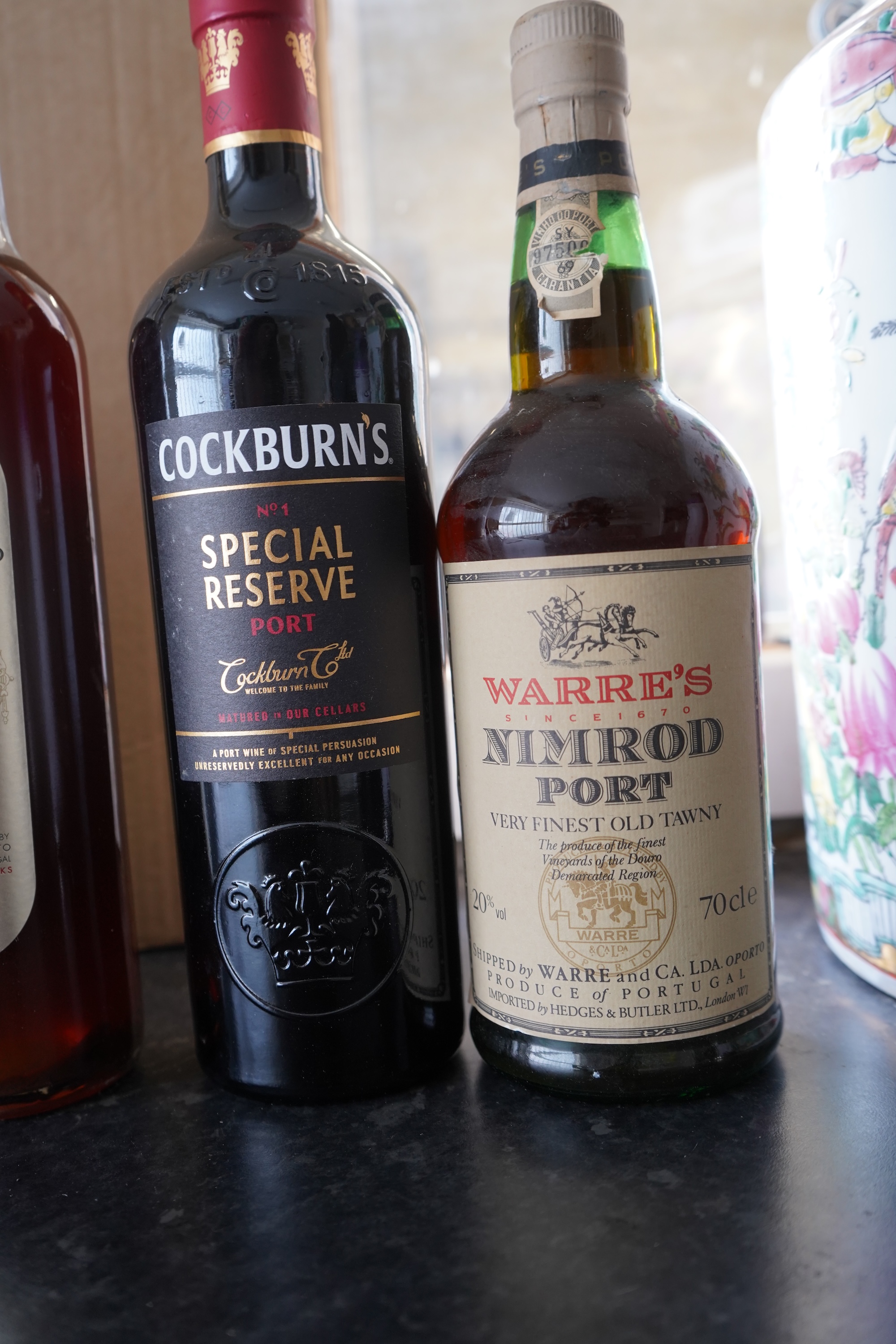 Eight bottles of champagne, port and rum to include Mumm, Laurent Perrier and Warres